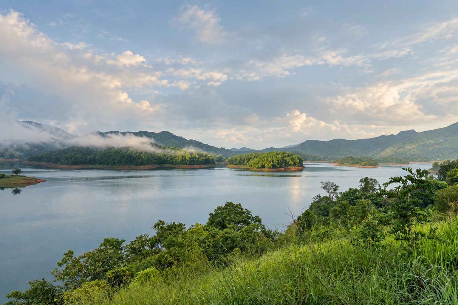 Banasura Sagar reservoir, green islands and distant hills in Wayanad