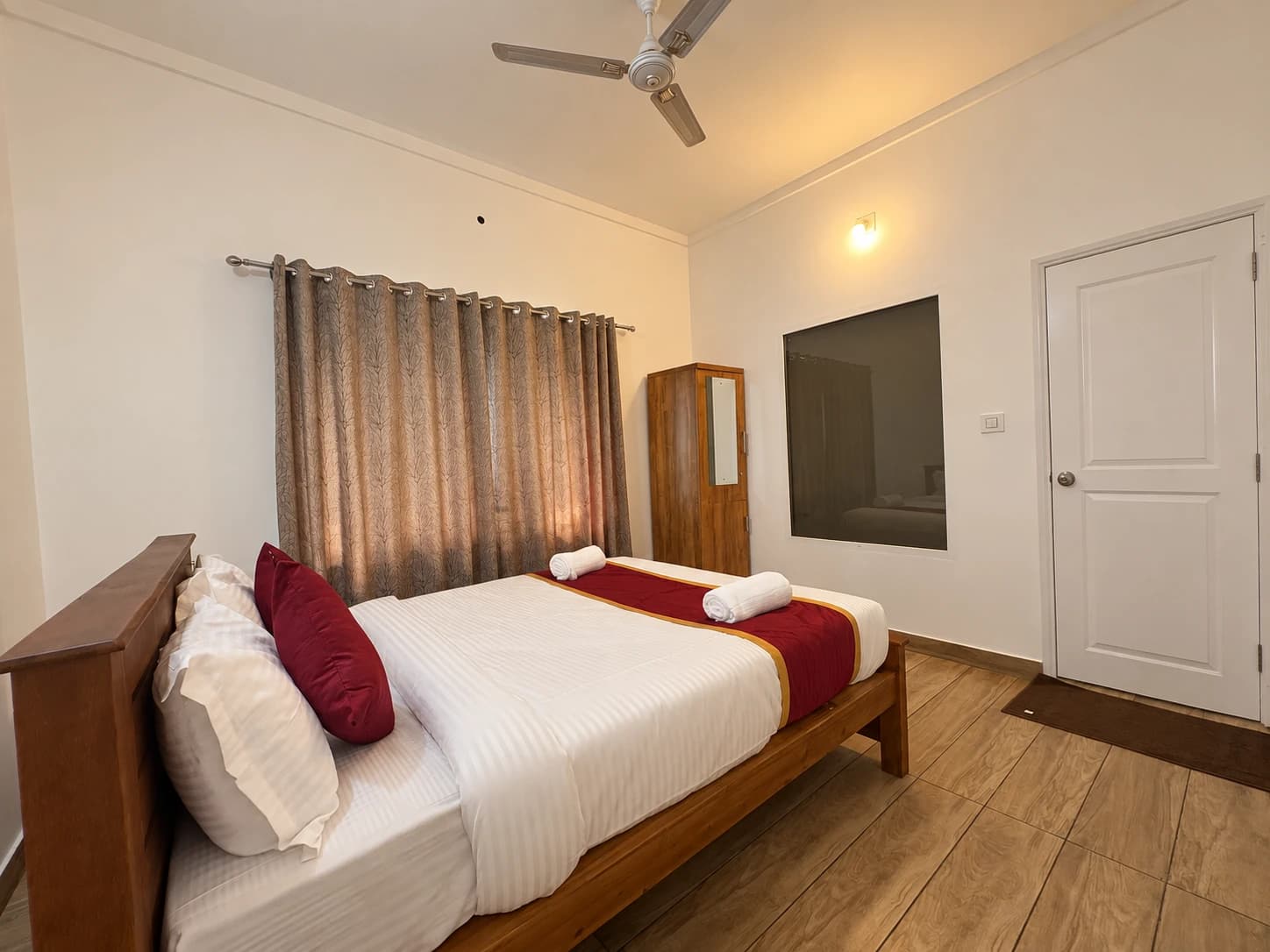 Golden Oak bedroom with the bathroom door closed