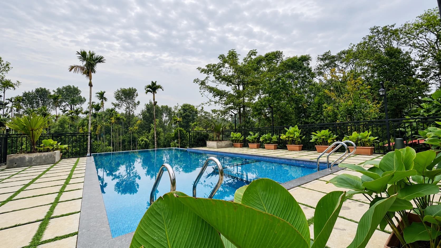 Pool and gardens at Golden Oak Resorts in Vythiri